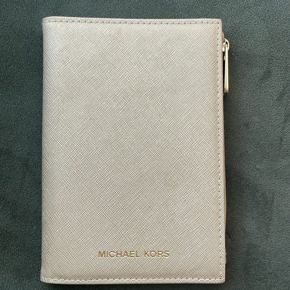 Michael Kors passport and credit card holder. Champagne color / gold hardware.